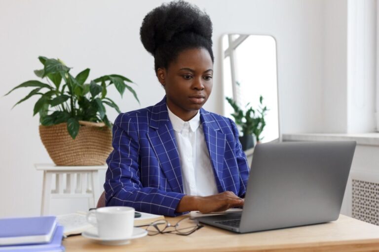 woman applying tips on how to write a grant